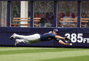 NEW YORK - APRIL 19:  Grady Sizemore #24 of the Cleveland Indians dives for a ball hit by Derek Jeter #2 of the New York Yankees at Yankee Stadium on April 19, 2009 in the Bronx borough of New York City.  (Photo by Ezra Shaw/Getty Images)