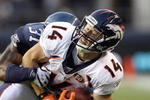 SEATTLE - AUGUST 22: Quarterback Brandon Stokley #14 of the Denver Broncos is sacked during the game against the Seattle Seahawks on August 22, 2009 at Qwest Field in Seattle, Washington. (Photo by Otto Greule Jr/Getty Images)   