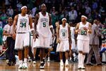 BOSTON - MAY 22:  Paul Pierce #34, Kevin Garnett #5, Rajon Rondo #9, and Eddie House #50 of the Boston Celtics walks on the court towards the end of the game against the Detroit Pistons during Game Two of the 2008 NBA Eastern Conference finals at the TD Banknorth Garden on May 22, 2008 in Boston, Massachusetts. NOTE TO USER: User expressly acknowledges and agrees that, by downloading and or using this photograph, User is consenting to the terms and conditions of the Getty Images License Agreement  (Photo by Jim Rogash/Getty Images)