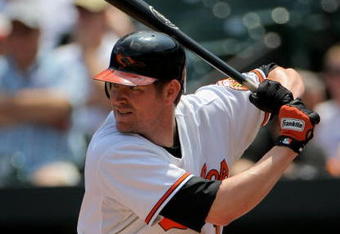 BALTIMORE - JULY 30:  Aubrey Huff #17 of the Baltimore Orioles takes an at bat against the Kansas City Royals during MLB action at Oriole Park at Camden Yards on July 30, 2009 in Baltimore, Maryland.  (Photo by Doug Pensinger/Getty Images)