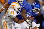 LEXINGTON, KY - NOVEMBER 28:  John Conner #38 of the Kentucky Wildcats runs with the ball while defended by Eric Berry #14 of the Tennessee Volunteers during the SEC game at Commonwealth Stadium on November 28, 2009 in Lexington, Kentucky.  (Photo by Andy Lyons/Getty Images)