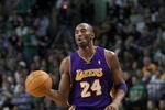 BOSTON - JANUARY 31:  Kobe Bryant  #24 the Los Angeles Lakers dribbles the ball toward the basket against the Boston Celtics to a loose ball in the second half at the TD Garden on January 31, 2010 in Boston, Massachusetts.  NOTE TO USER: User expressly acknowledges and agrees that, by downloading and or using this photograph, User is consenting to the terms and conditions of the Getty Images License Agreement. (Photo by Jim Rogash /Getty Images)