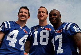 MIAMI GARDENS, FL - FEBRUARY 02:  Dallas Clark #44, Peyton Manning #18 and Reggie Wayne #87 of the Indianapolis Colts pose on the field during Super Bowl XLIV Media Day at Sun Life Stadium on February 2, 2010 in Miami Gardens, Florida.  (Photo by Doug Benc/Getty Images)