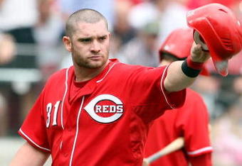 CINCINNATI - JULY 02:  Jonny Gomes #31 of the Cincinnati Reds celebrates after scoring a run during the game against the Arizona Diamondbacks on July 2, 2009 in Cincinnati, Ohio.  (Photo by Andy Lyons/Getty Images)
