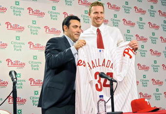 PHILADELPHIA - DECEMBER 16: Pitcher Roy Halladay of the Philadelphia Phillies and senior vice president and general manager Ruben Amaro, Jr. pose for a photograph on December 16, 2009 at Citizens Bank Park in Philadelphia, Pennsylvania. (Photo by Drew Hallowell/Getty Images)