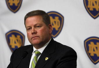 SOUTH BEND, IN - DECEMBER 11: Brian Kelly attends a press conference where he was named new football head coach at Notre Dame University on December 11, 2009 in South Bend, Indiana.  Kelly most recently led the University of Cincinnati to two consecutive Bowl Championship Series appearances including a perfect 12-0 record this past season. (Photo by Frank Polich/Getty Images)