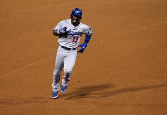 PHILADELPHIA - OCTOBER 21:  Orlando Hudson #13 of the Los Angeles Dodgers rounds the bases after hitting a home run in the fifth inning against the Philadelphia Phillies in Game Five of the NLCS during the 2009 MLB Playoffs at Citizens Bank Park on October 21, 2009 in Philadelphia, Pennsylvania.  (Photo by Nick Laham/Getty Images)