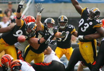 PITTSBURGH - NOVEMBER 15:  Keyaron Fox #57 of the Pittsburgh Steelers and his defensive teammates try to block a field goal attempt by the Cincinnati Bengals during their game at Heinz Field on November 15, 2009 in Pittsburgh, Pennsylvania. The Bengals defeated the Steelers 18-12. (Photo by Rick Stewart/Getty Images)