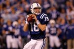INDIANAPOLIS - JANUARY 24:  Quarterback Peyton Manning #18 of the Indianapolis Colts looks to pass  while playing against the New York Jets during the AFC Championship Game at Lucas Oil Stadium on January 24, 2010 in Indianapolis, Indiana. The Colts defeated the Jets 30-17.  (Photo by Jonathan Daniel/Getty Images)