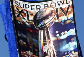 MIAMI GARDENS, FL - FEBRUARY 07:  A vendor sells programs outside Sun Life Stadium before Super Bowl XLIV between the Indianapolis Colts and the New Orleans Saints on February 7, 2010 in Miami Gardens, Florida.  (Photo by Doug Benc/Getty Images)