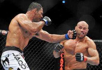 PORTLAND, OR - AUGUST 29:  UFC fighter Antonio Nogueira (L) battles UFC fighter Randy Couture (R) during their Heavyweight bout at UFC 102:  Couture vs. Nogueira at the Rose Garden Arena on August 29, 2009 in Portland, Oregon.  (Photo by Jon Kopaloff/Getty Images)