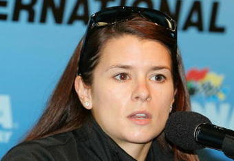DAYTONA BEACH, FL - FEBRUARY 05:  Danica Patrick, driver of the #7 GoDaddy.com Chevrolet, speaks to the media after qualifying for the ARCA Racing Series Lucas Oil Slick Mist 200 at Daytona International Speedway on February 5, 2010 in Daytona Beach, Florida.  (Photo by Todd Warshaw/Getty Images)
