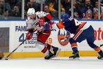UNIONDALE, NY - FEBRUARY 06:  Ray Whitney #13 of the Carolina Hurricanes controls the puck from Andrew MacDonald #47 of the New York Islanders on February 6, 2010 at Nassau Coliseum in Uniondale, New York.  (Photo by Jim McIsaac/Getty Images)