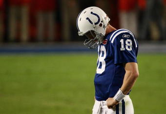 MIAMI GARDENS, FL - FEBRUARY 07:  Peyton Manning #18 of the Indianapolis Colts reacts after a play against the New Orleans Saints during Super Bowl XLIV on February 7, 2010 at Sun Life Stadium in Miami Gardens, Florida.  (Photo by Win McNamee/Getty Images)