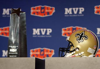 FORT LAUDERDALE, FL - FEBRUARY 08:  The Pete Rozelle Trophy for Super Bowl XLIV Most Valuable Player quarterback Drew Brees #9 of the New Orleans Saints sits near the podium before Super Bowl Champion Coach Press Conference at the Fort Lauderdale Convention Center on February 8, 2010 in Fort Lauderdale, Florida.  (Photo by Doug Benc/Getty Images)