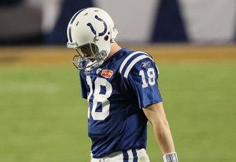 MIAMI GARDENS, FL - FEBRUARY 07:  Peyton Manning #18 of the Indianapolis Colts walks on the field against the New Orleans Saints during Super Bowl XLIV on February 7, 2010 at Sun Life Stadium in Miami Gardens, Florida.  (Photo by Jed Jacobsohn/Getty Images)