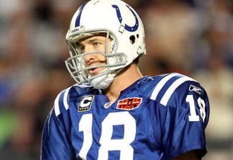 MIAMI GARDENS, FL - FEBRUARY 07:  Peyton Manning #18 of the Indianapolis Colts reacts as he walks off the field against the New Orleans Saints during Super Bowl XLIV on February 7, 2010 at Sun Life Stadium in Miami Gardens, Florida.  (Photo by Ronald Martinez/Getty Images)