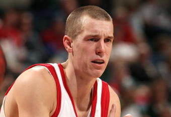 INDIANAPOLIS - MARCH 13:  Jason Bohannon #12 of the Wisconsin Badgers gestures against the Ohio State Buckeyes during the second round of the Big Ten Men's Basketball Tournament at Conseco Fieldhouse on March 13, 2009 in Indianapolis, Indiana.  (Photo by Jonathan Daniel/Getty Images)