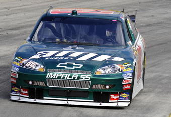 MARTINSVILLE, VA - OCTOBER 23: Dale Earnhardt Jr. drives the #88 AMP Energy / National Guard Chevrolet during qualifying for the NASCAR Sprint Cup Series TUMS Fast Relief 500 at Martinsville Speedway on October 23, 2009 in Martinsville, Virginia.  (Photo by John Harrelson/Getty Images)