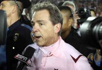PASADENA, CA - JANUARY 07:  Head coach Nick Saban of the Alabama Crimson Tide talks to reporters on the field after winning the Citi BCS National Championship game over the Texas Longhorns at the Rose Bowl on January 7, 2010 in Pasadena, California. The Crimson Tide defeated the Longhorns 37-21.  (Photo by Stephen Dunn/Getty Images)