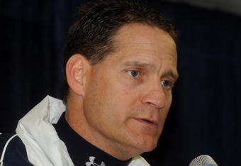 TAMPA, FL - JANUARY 1: Coach Gene Chizik of the Auburn Tigers talks to the media after play against the Northwestern Wildcats in the Outback Bowl January 1, 2010 at Raymond James Stadium in Tampa, Florida.  (Photo by Al Messerschmidt/Getty Images) 