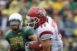 EUGENE, OR - SEPTEMBER 19: Luke Matthews #11 of the Utah Utes eludes a tackle as he runs back a punt in the 1st quarter of the game against the Oregon Ducks at Autzen Stadium on September 19, 2009 in Eugene, Oregon. Oregon won the game 31-24. (Photo by Steve Dykes/Getty Images)