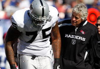 EAST RUTHERFORD, NJ - OCTOBER 11: Mario Henderson #75 of the Oakland Raiders walks off the field with an injury during the game against the New York Giants on October 11, 2009 at Giants Stadium in East Rutherford, New Jersey. (Photo by Jared Wickerham/Getty Images)