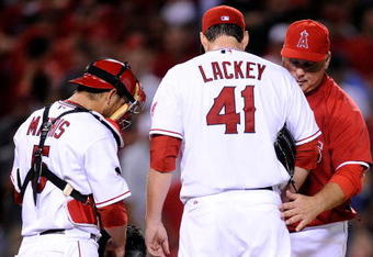ANAHEIM, CA - OCTOBER 22:  Manager Mike Scioscia of the Los Angeles Angels of Anaheim pulls John Lackey #41 from the game during the seventh inning in Game Five of the ALCS against the New York Yankees during the 2009 MLB Playoffs at Angel Stadium on October 22, 2009 in Anaheim, California.  (Photo by Kevork Djansezian/Getty Images)