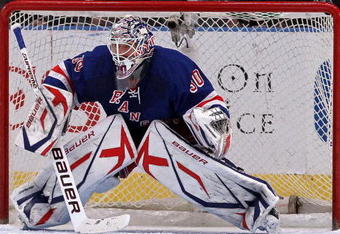NEW YORK - FEBRUARY 04:  Henrik Lundqvist #30 of the New York Rangers defends his net against the Washington Capitals on February 4, 2010 at Madison Square Garden in New York City.  (Photo by Jim McIsaac/Getty Images)