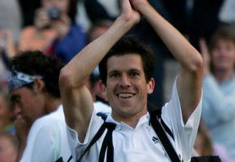 LONDON - JUNE 28: Tim Henman of Great Britain acknowledges the crowd after his fourth round match victory against Mark Philippoussis of Australia at the Wimbledon Lawn Tennis Championship on June 28, 2004 at the All England Lawn Tennis and Croquet Club in London.  (Photo by Clive Brunskill/Getty Images))