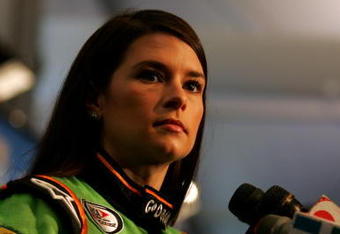 DAYTONA BEACH, FL - FEBRUARY 04:  Danica Patrick, driver of the #7 GoDaddy.com Chevrolet, is interviewed during NASCAR media day at Daytona International Speedway on February 4, 2010 in Daytona Beach, Florida.  (Photo by Todd Warshaw/Getty Images for NASCAR)