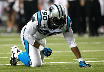 ATLANTA - SEPTEMBER 20:  Julius Peppers #90 of the Carolina Panthers is slow to get up against the Atlanta Falcons at Georgia Dome on September 20, 2009 in Atlanta, Georgia.  (Photo by Kevin C. Cox/Getty Images)