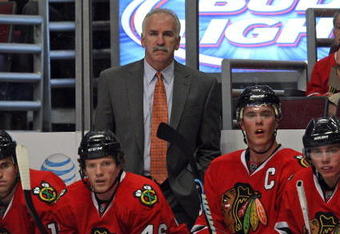 CHICAGO - OCTOBER 21: Head coach Joel Quenneville of the Chicago Blackhawks watches as his team takes on the Vancouver Canucks at the United Center on October 14, 2009 in Chicago, Illinois. The Canucks defeated the Blackhawks 3-2. (Photo by Jonathan Daniel/Getty Images)