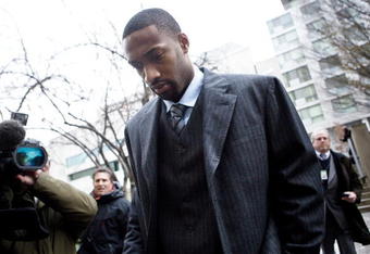 WASHINGTON -  JANUARY 15:  NBA player Gilbert Arenas arries at District of Columbia Court January 15, 2010 in Washington, DC.  The Washington Wizards star was to appear in court to answer to felony charges for bringing gun into the Wizards locker room.  (Photo by Brendan Smialowski/Getty Images)