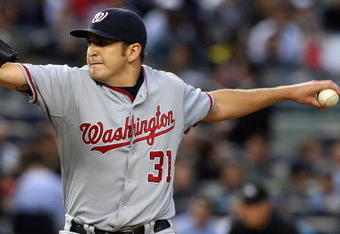 NEW YORK - JUNE 17:  John Lannan #31 of the Washington Nationals deals a pitch against the New York Yankees on June 17, 2009 at Yankee Stadium in the Bronx borough of New York City.  (Photo by Jim McIsaac/Getty Images)