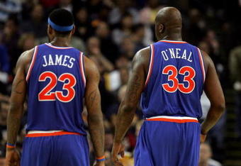 OAKLAND, CA - JANUARY 11:  LeBron James #23 and Shaquille O'Neal #33 of the Cleveland Cavaliers stand on the court during their game against the Golden State Warriors at Oracle Arena on January 11, 2010 in Oakland, California.  NOTE TO USER: User expressly acknowledges and agrees that, by downloading and/or using this Photograph, user is consenting to the terms and conditions of the Getty Images License Agreement.  (Photo by Ezra Shaw/Getty Images)
