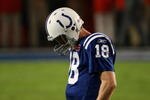 MIAMI GARDENS, FL - FEBRUARY 07:  Peyton Manning #18 of the Indianapolis Colts reacts after a play against the New Orleans Saints during Super Bowl XLIV on February 7, 2010 at Sun Life Stadium in Miami Gardens, Florida.  (Photo by Win McNamee/Getty Images)