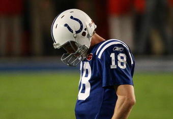 MIAMI GARDENS, FL - FEBRUARY 07:  Peyton Manning #18 of the Indianapolis Colts reacts after a play against the New Orleans Saints during Super Bowl XLIV on February 7, 2010 at Sun Life Stadium in Miami Gardens, Florida.  (Photo by Win McNamee/Getty Images)