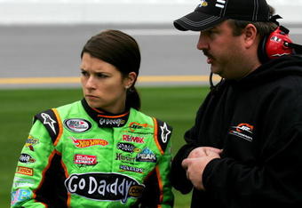 DAYTONA BEACH, FL - FEBRUARY 05:  Danica Patrick (L), driver of the #7 GoDaddy.com Chevrolet, talks with crew chief Tony Eury Jr. (R), during qualifying for the ARCA Racing Series Lucas Oil Slick Mist 200 at Daytona International Speedway on February 5, 2010 in Daytona Beach, Florida.  (Photo by Todd Warshaw/Getty Images)