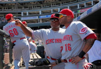DENVER - SEPTEMBER 07:  Darnell McDonald #16 of the Cincinnati Reds recieves instruction from coach Billy Hatcher #22 against the Colorado Rockies at Coors Field on September 7, 2009 in Denver, Colorado. The Rockies defeated the Reds 4-3.  (Photo by Doug Pensinger/Getty Images)