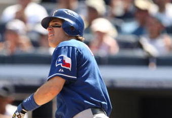 NEW YORK - AUGUST 27:  Ian Kinsler  #5 of the Texas Rangers hits a three run homerun in the fourth inning against the New York Yankees during the MLB game on August 27, 2009 at Yankees Stadium in the Bronx borough of New York City. (Photo by Al Bello/Getty Images)