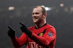 MANCHESTER, ENGLAND - JANUARY 23:  Wayne Rooney of Manchester United celebrates scoring his hat-trick during the Barclays Premier League match between Manchester United and Hull City at Old Trafford on January 23, 2010 in Manchester, England.  (Photo by Julian Finney/Getty Images)