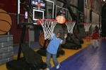 HOUSTON - FEBRUARY 18:  A young fan shoots a basket at the NBA All-Star Jam Session during NBA All-Star Weekend at the George R. Brown Convention Center on February 18, 2006 in Houston, Texas.  NOTE TO USER: User expressly acknowledges and agrees that, by downloading and or using this photograph, user is consenting to the terms and conditions of the Getty Images License Agreement.  (Photo by Lisa Blumenfeld/Getty Images)