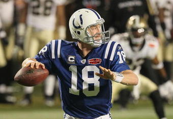 MIAMI GARDENS, FL - FEBRUARY 07:  Peyton Manning #18 of the Indianapolis Colts passes against the New Orleans Saints during Super Bowl XLIV on February 7, 2010 at Sun Life Stadium in Miami Gardens, Florida.  (Photo by Jed Jacobsohn/Getty Images)