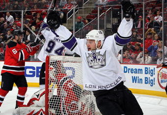 NEWARK, NJ - JANUARY 31:  Brad Richardson #15 of the Los Angeles Kings celebrates his teams second goal against the New Jersey Devils at the Prudential Center on January 31, 2010 in Newark, New Jersey. The Kings defeated the Devils 3-2.  (Photo by Jim McIsaac/Getty Images)
