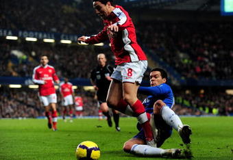 LONDON, ENGLAND - FEBRUARY 07:  Michael Ballack of Chelsea tackles Samir Nasri of Arsenal during the Barclays Premier League match between Chelsea and Arsenal at Stamford Bridge on February 7, 2010 in London, England.  (Photo by Mike Hewitt/Getty Images)