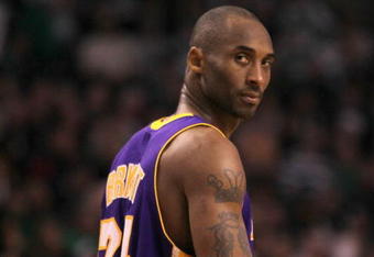 BOSTON - JANUARY 31:  Kobe Bryant  #24 the Los Angeles Lakers looks over his shoulder during the closing minutes of a game  against the Boston Celtics at the TD Garden on January 31, 2010 in Boston, Massachusetts.  The Lakers won 90-89. NOTE TO USER: User expressly acknowledges and agrees that, by downloading and or using this photograph, User is consenting to the terms and conditions of the Getty Images License Agreement. (Photo by Jim Rogash /Getty Images)