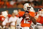 MIAMI GARDENS, FL - OCTOBER 03:  Quarterback Jacory Harris #12 of the Miami Hurricanes drops back to pass against the Oklahoma Sooners at Land Shark Stadium on October 3, 2009 in Miami Gardens, Florida. Miami defeated Oklahoma 21-20.  (Photo by Doug Benc/Getty Images)