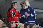 NEWARK, NJ - JANUARY 29: A Toronto Maple Leafs fan and a fan of the New Jersey Devils chat during second period action at the Prudential Center on January 29, 2010 in Newark, New Jersey.  (Photo by Bruce Bennett/Getty Images)