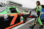 DAYTONA BEACH, FL - FEBRUARY 05:  Danica Patrick, driver of the #7 GoDaddy.com Chevrolet, walks to her car during qualifying for the ARCA Racing Series Lucas Oil Slick Mist 200 at Daytona International Speedway on February 5, 2010 in Daytona Beach, Florida.  (Photo by Todd Warshaw/Getty Images)
